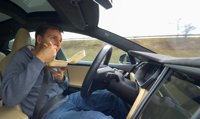 Man Eating While Driving