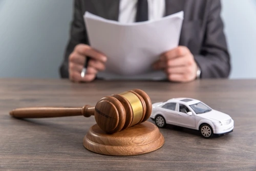 South Carolina construction zone car accident lawyer with model car and judge gavel