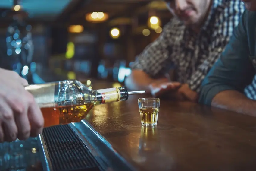 South Carolina dram shop liability concept showing bar serving alcohol to patron who may later cause drunk driving accident
