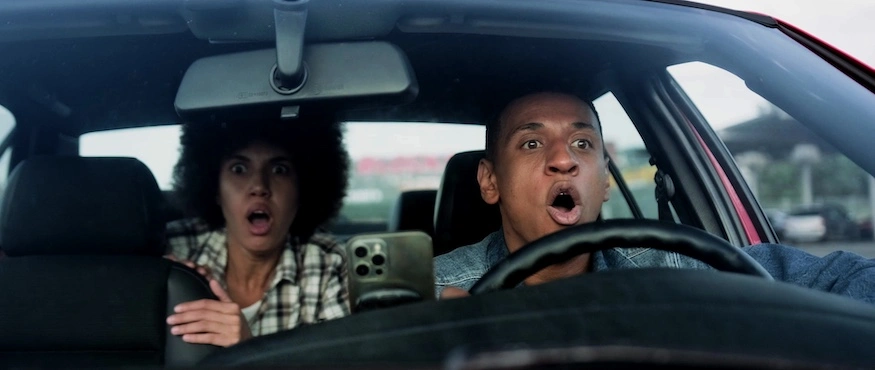 This image depicts the reactions of two people about to be in a rideshare accident in South Carolina.
