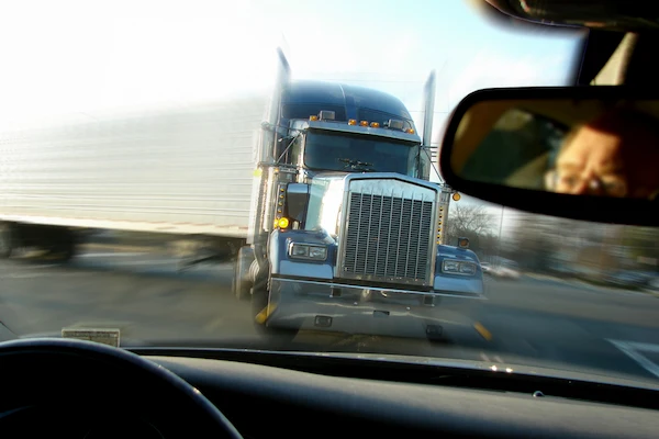 A driver sees a tractor trailer before a commercial truck crash.